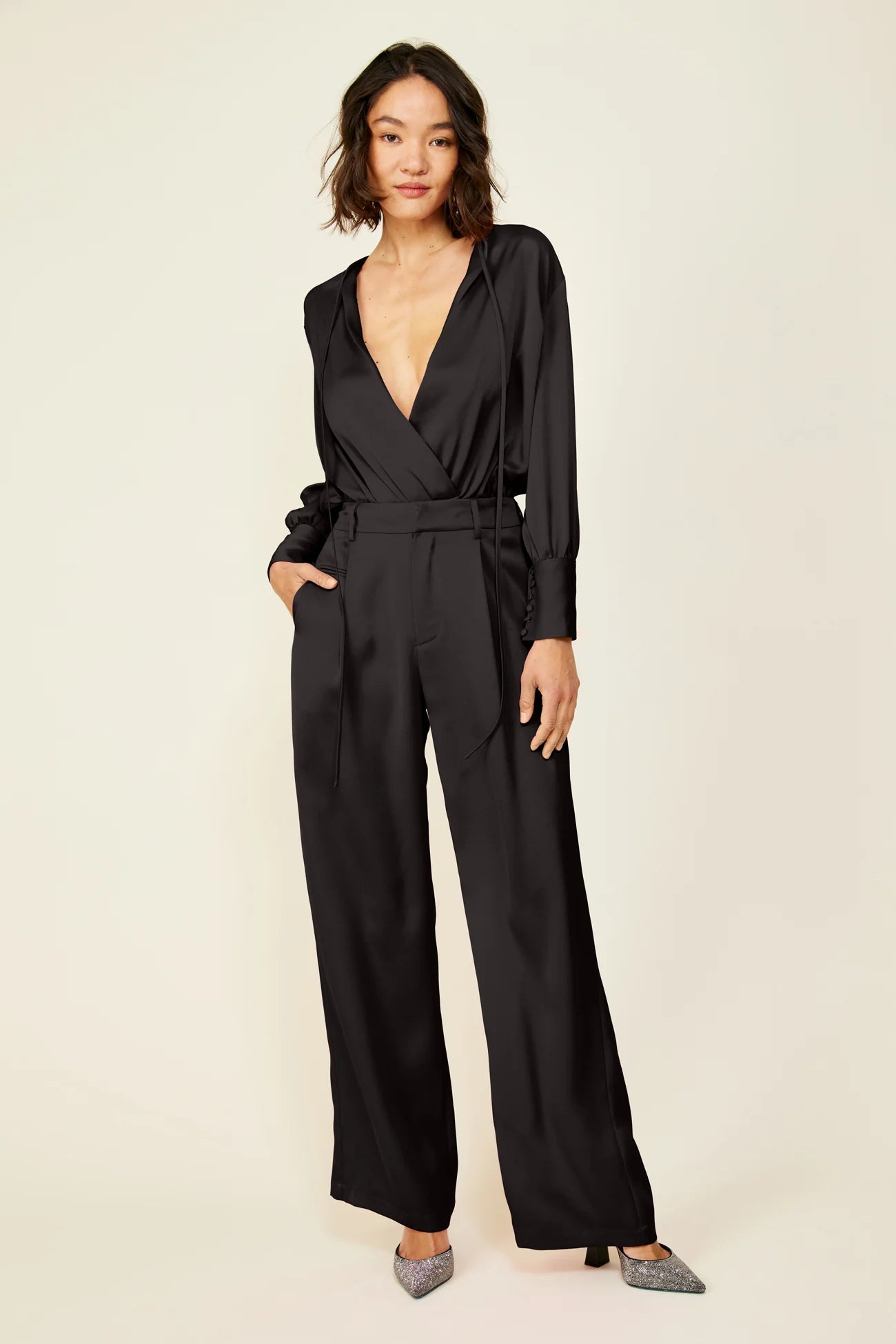 Picture of a model using the Line & Dot Black Bodysuit - CT Grace