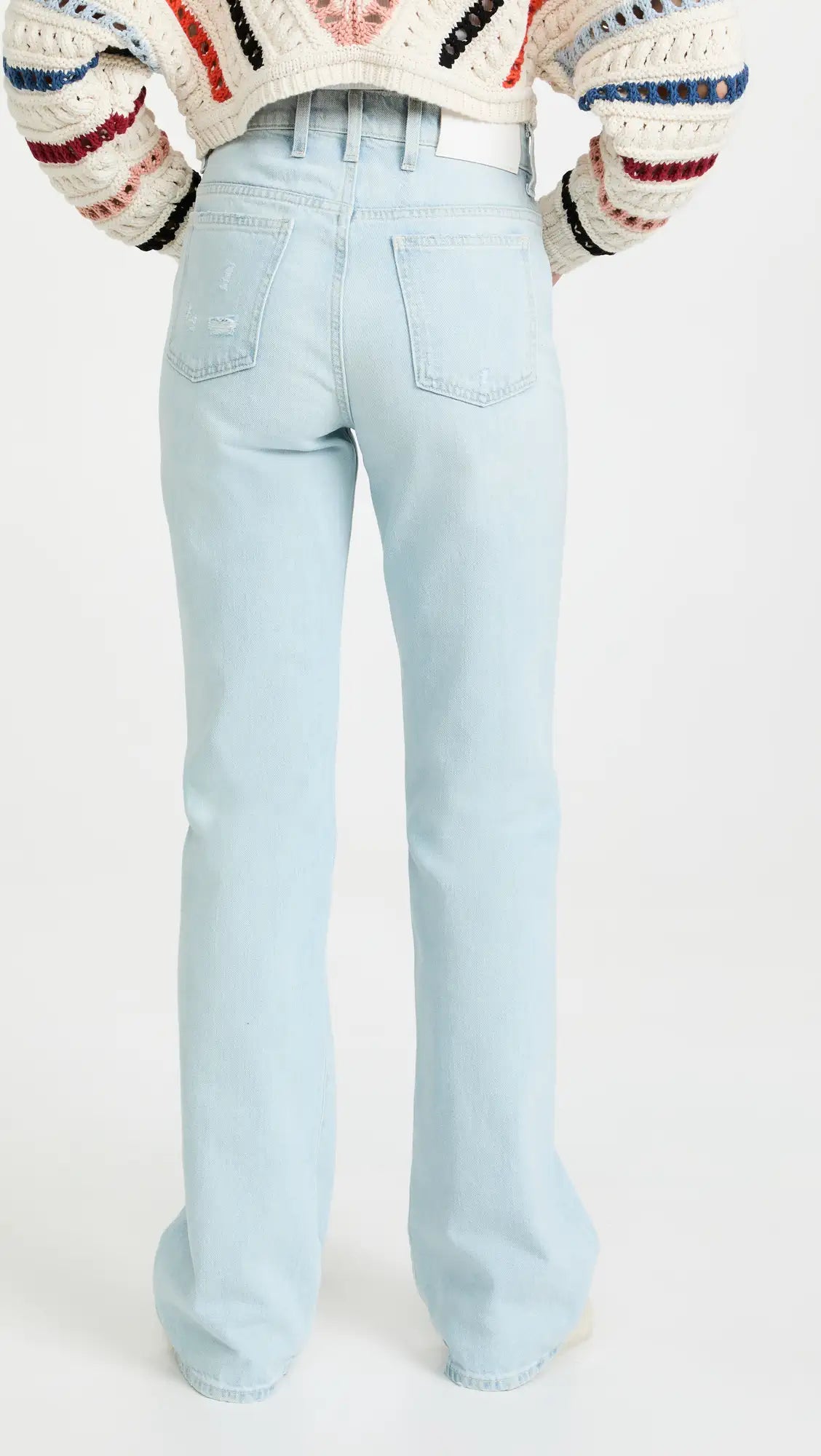 Back Picture of a model wearing the 7 For All Mankind Easy Boot Jean in Light Wash - CT Grace
