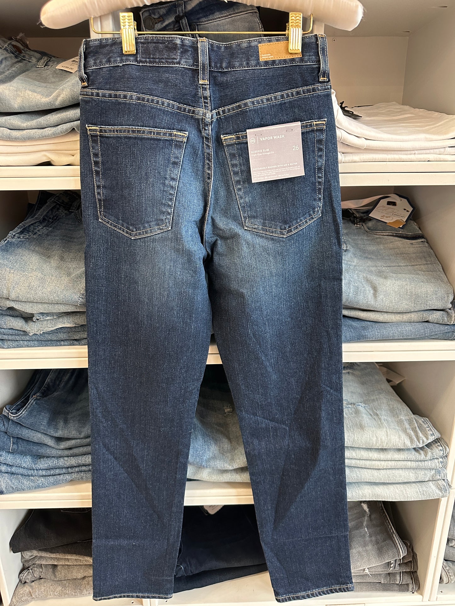 Back picture of a model using the AG Jeans Alexxis Slim Dark Wash High Rise Vintage - CT Grace