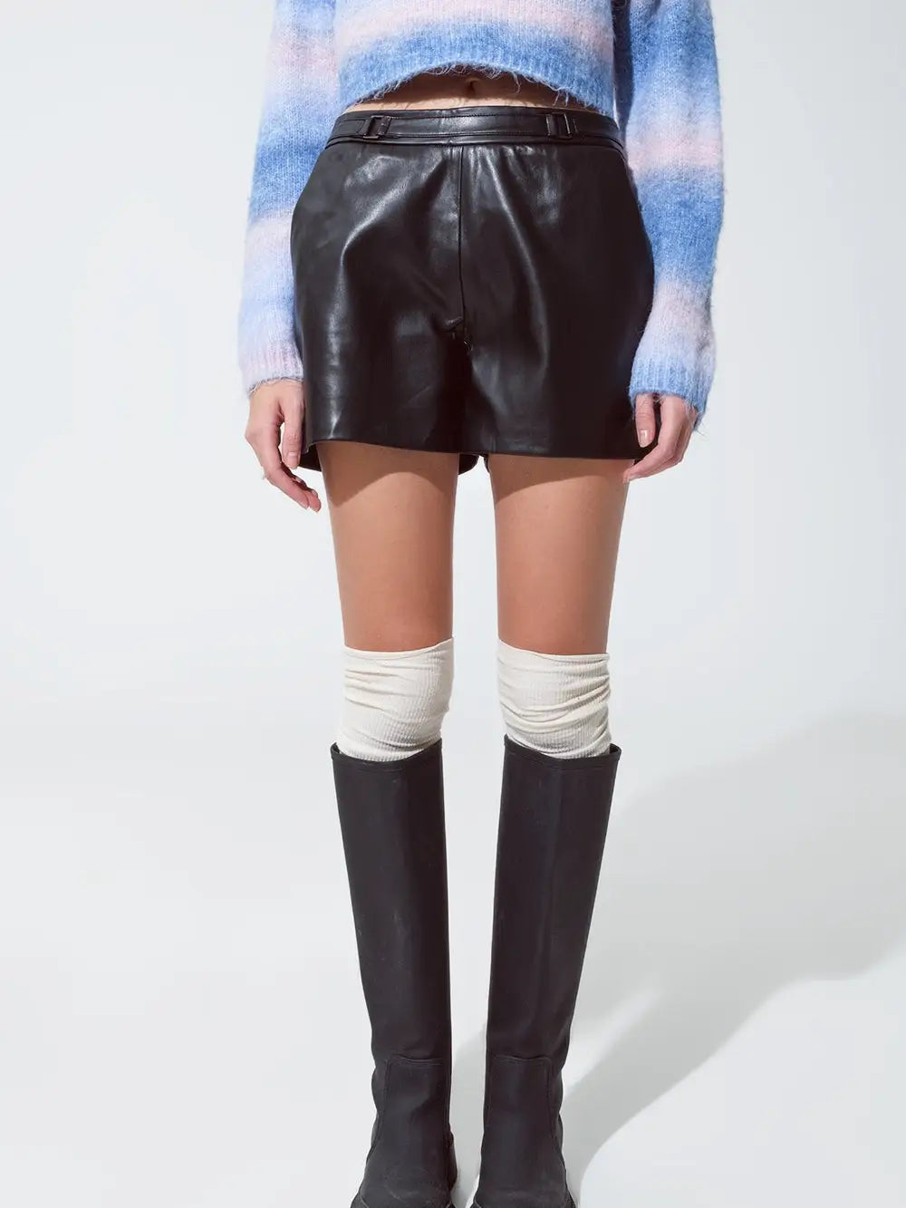 Front picture of a model wearing the Q2 Faux Leather Short Shorts with Waist Detail - CT Grace