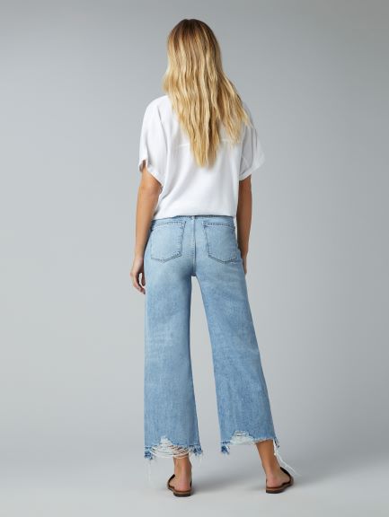 Back picture of a model wearing the DL 1961 Hepburn Wide Leg High Rise - CT Grace