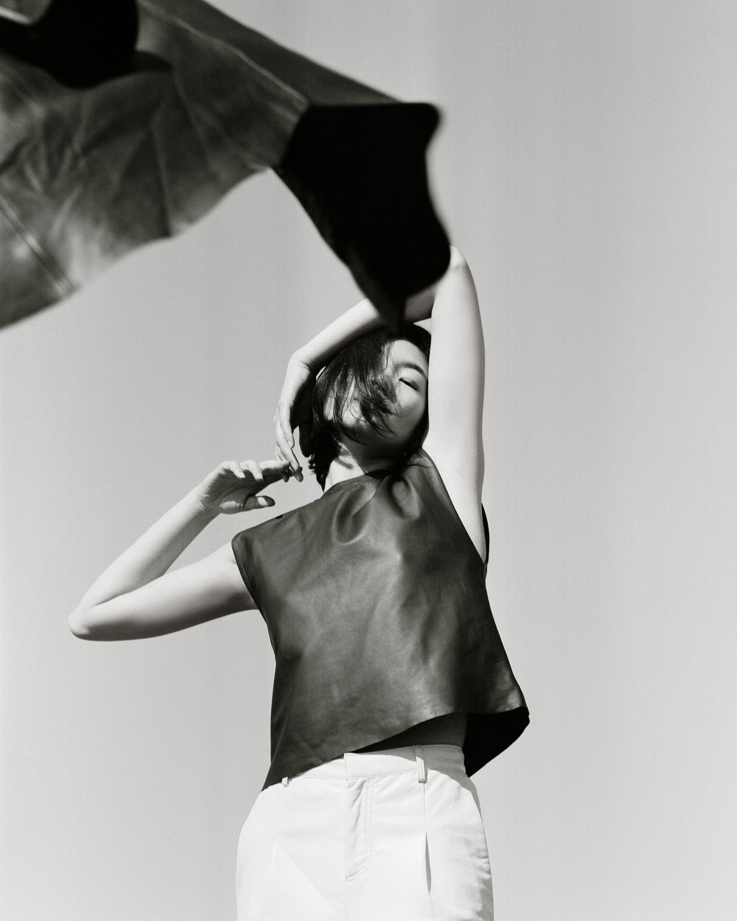 Picture of a model using the ASbyDF Recycled Leather Tee Black - CT Grace
