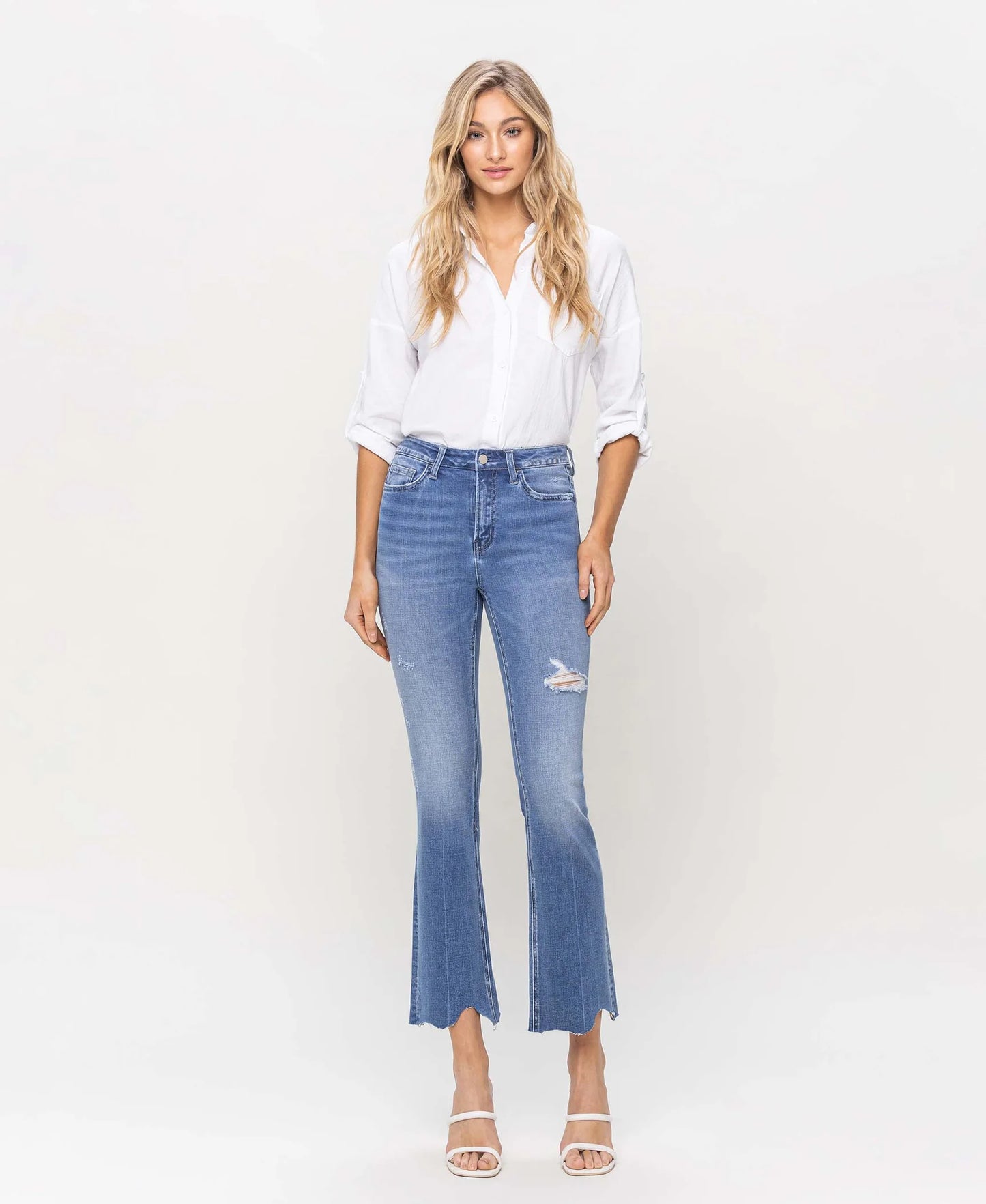 Picture of a model using the Flying Monkey High Rise Kick Flare with Uneven Hem - CT Grace