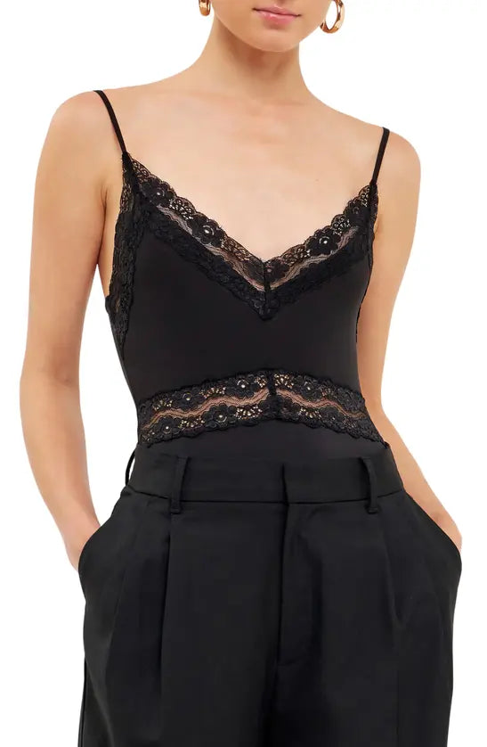 Body picture of a model using the Endless Rose Lace Bodysuit Black - CT Grace