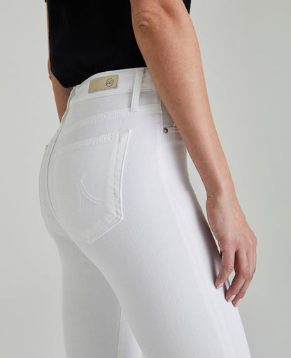 Side picture of a model wearing the AG White the Farrah Skinny ankle - CT Grace
