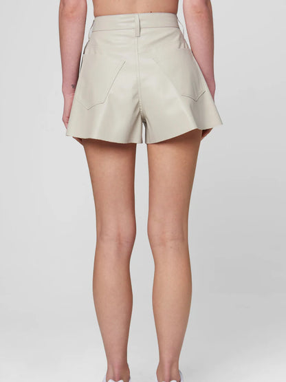 Back Picture of a model using the Blank NYC Dash Shorts Tan Faux Leather - CT Grace