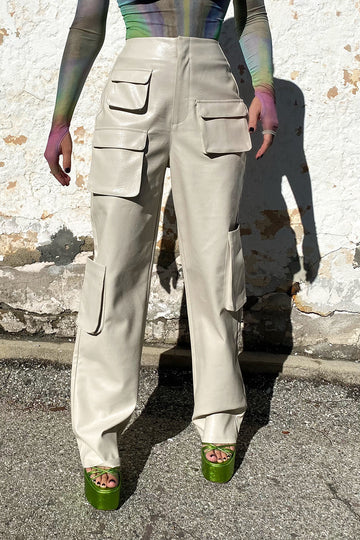 Picture of a blonde model using the AFRM Sigmund Cargo Pants - CT Grace