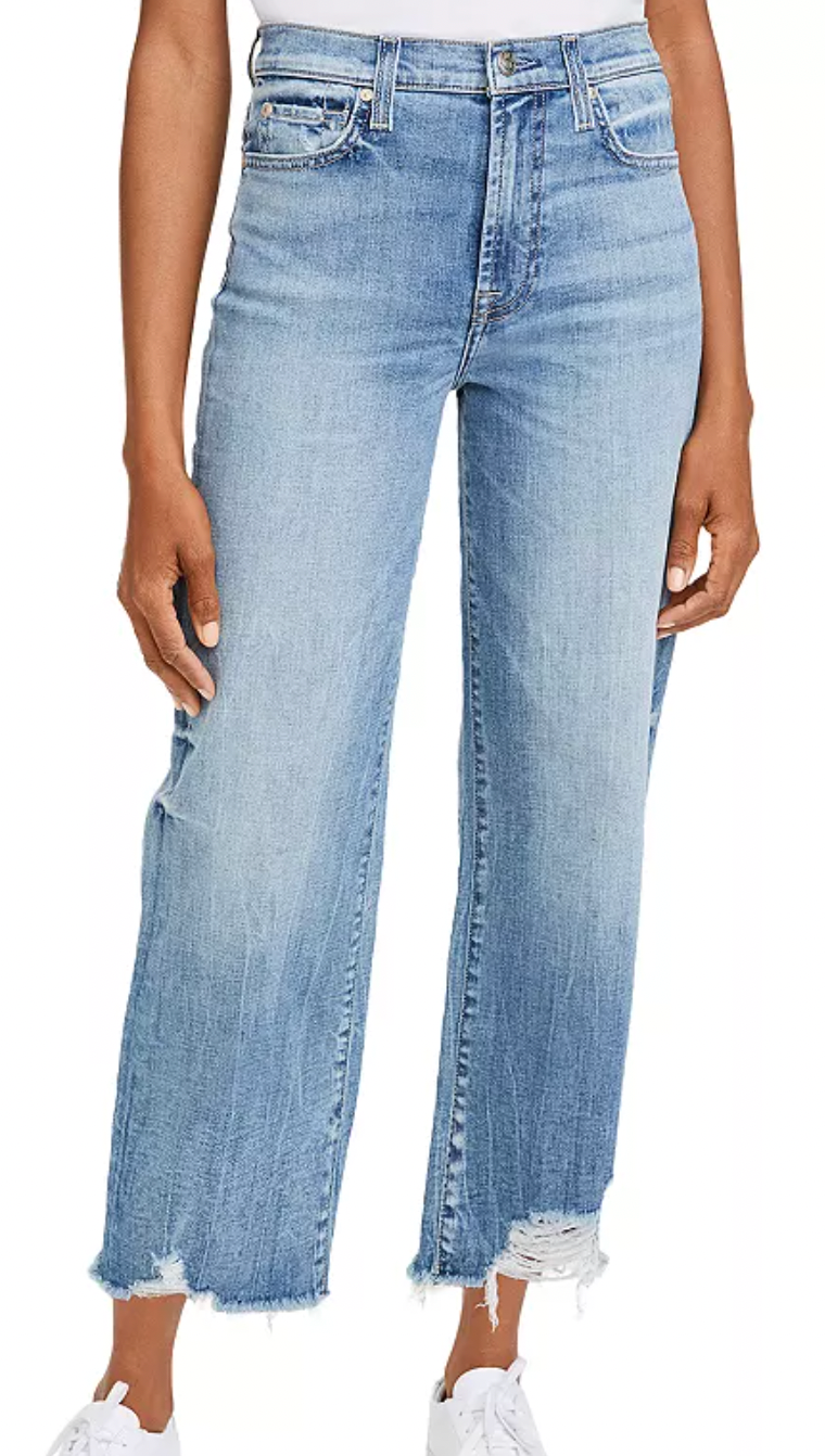 Front picture of a model wearing the 7 For All Mankind Cropped Alexa Wide-Leg Jeans in Lovechild - CT Grace